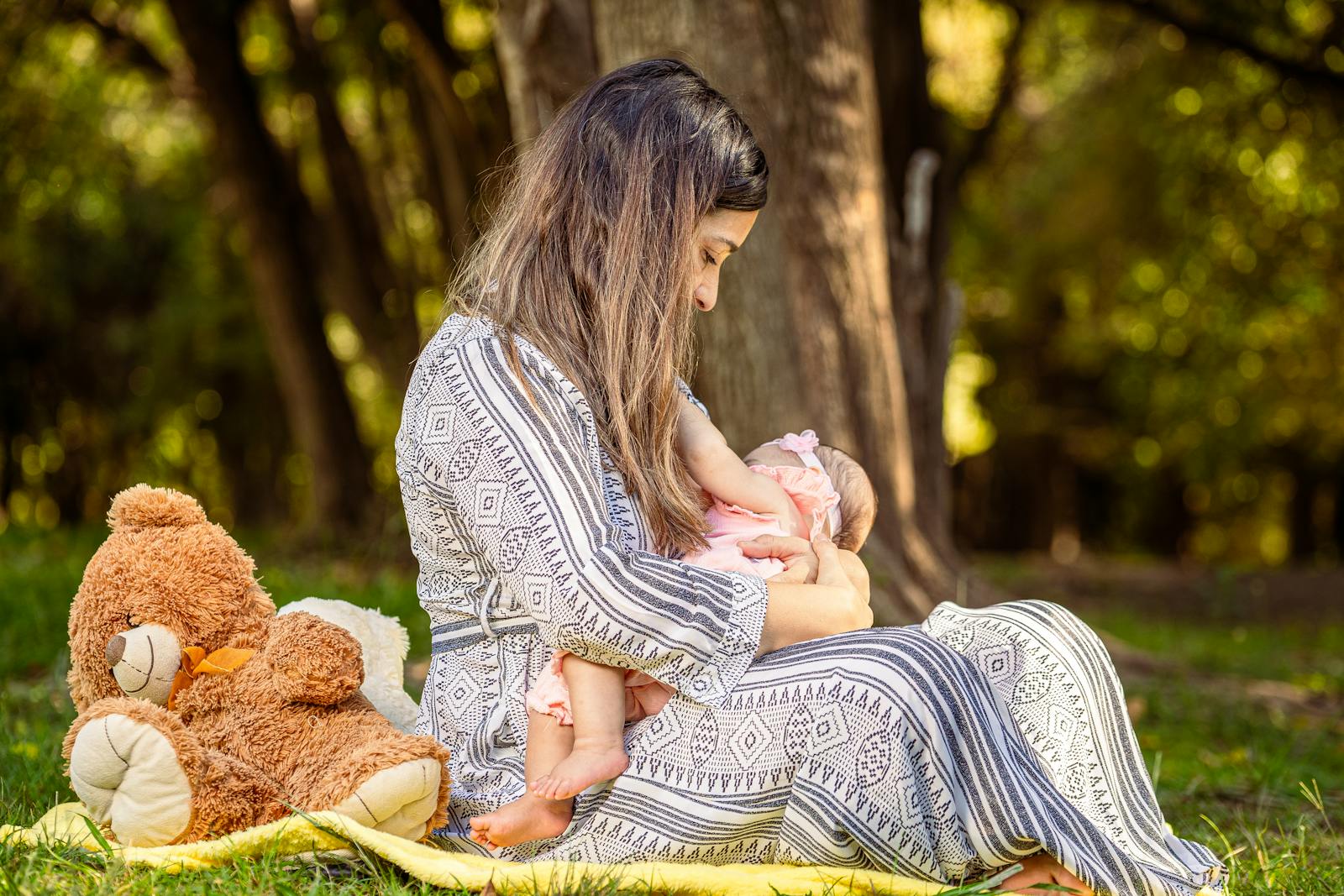 Mother gently holding her baby