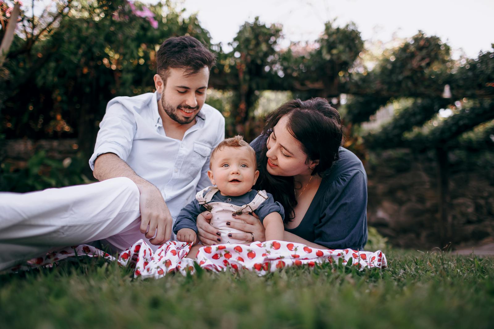 Young family enjoying an outdoor picnic