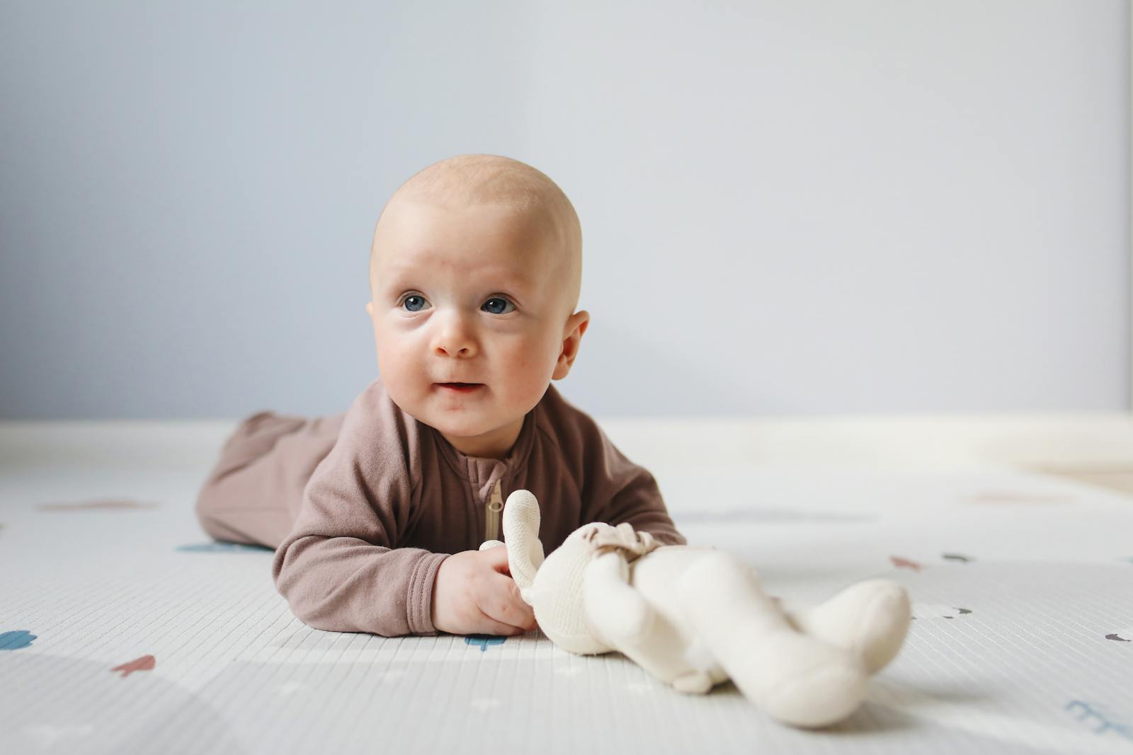 Infant on a play mat