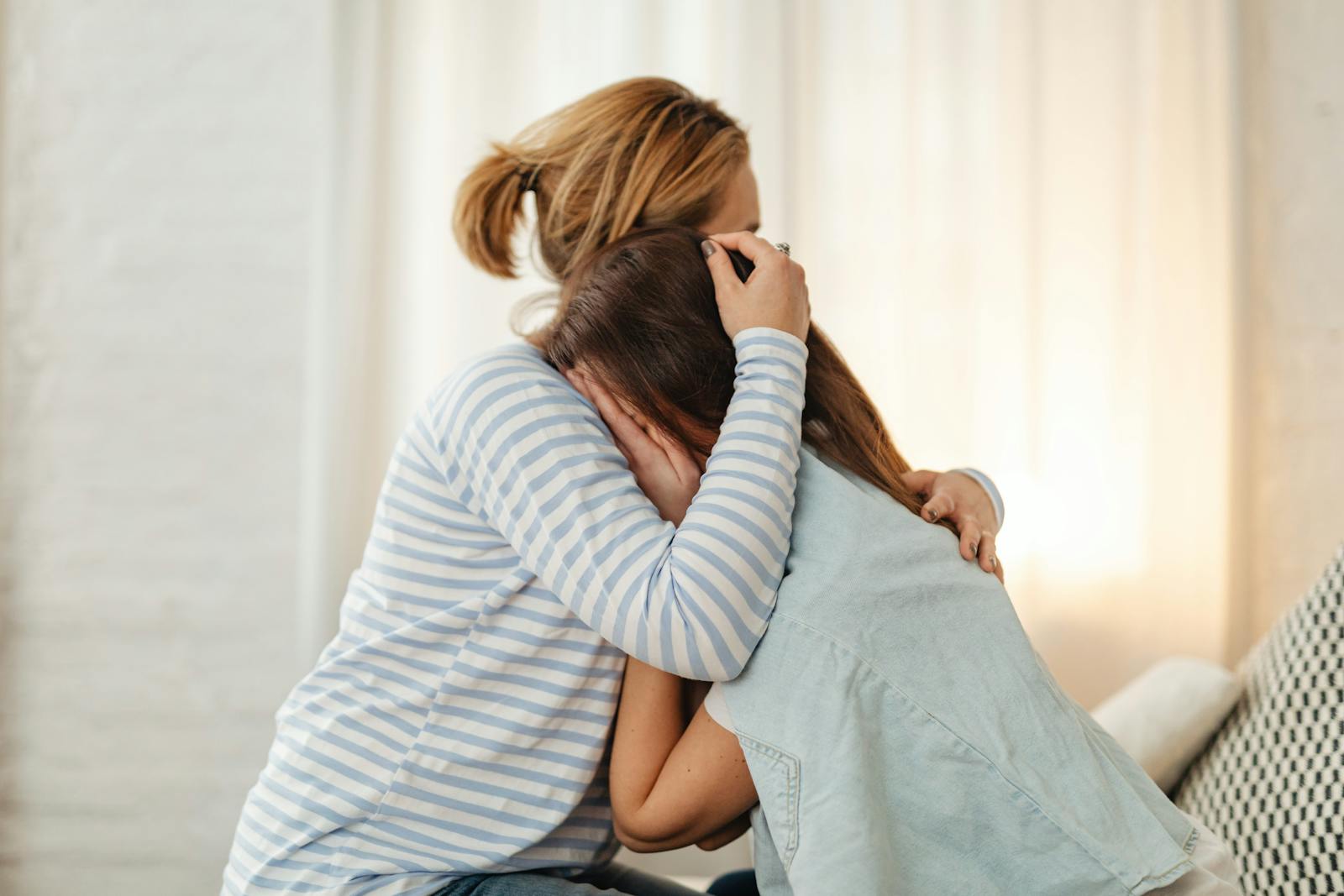 Parent comforting an upset child