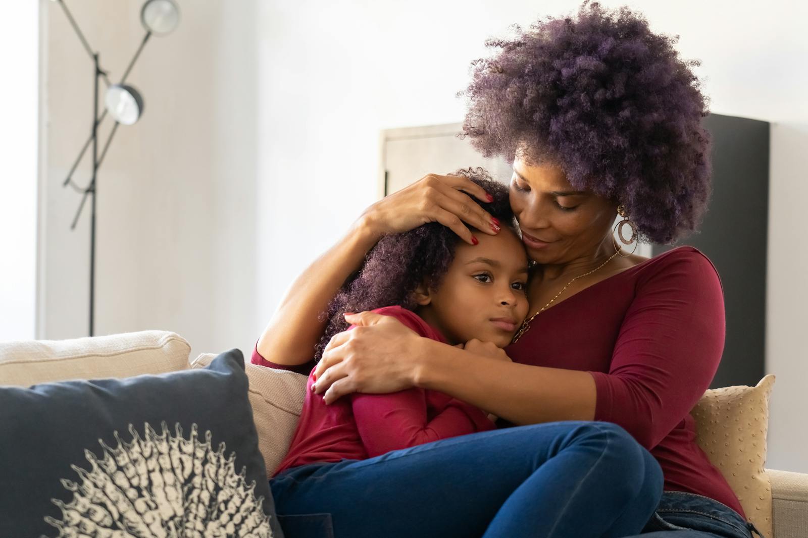Parent comforting a worried child