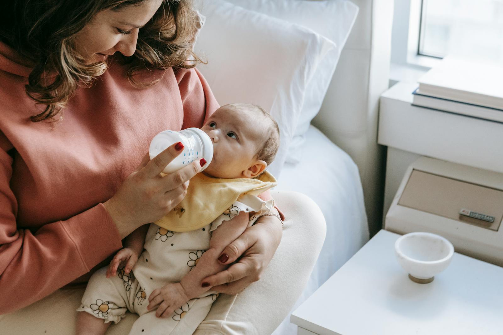 Baby being fed