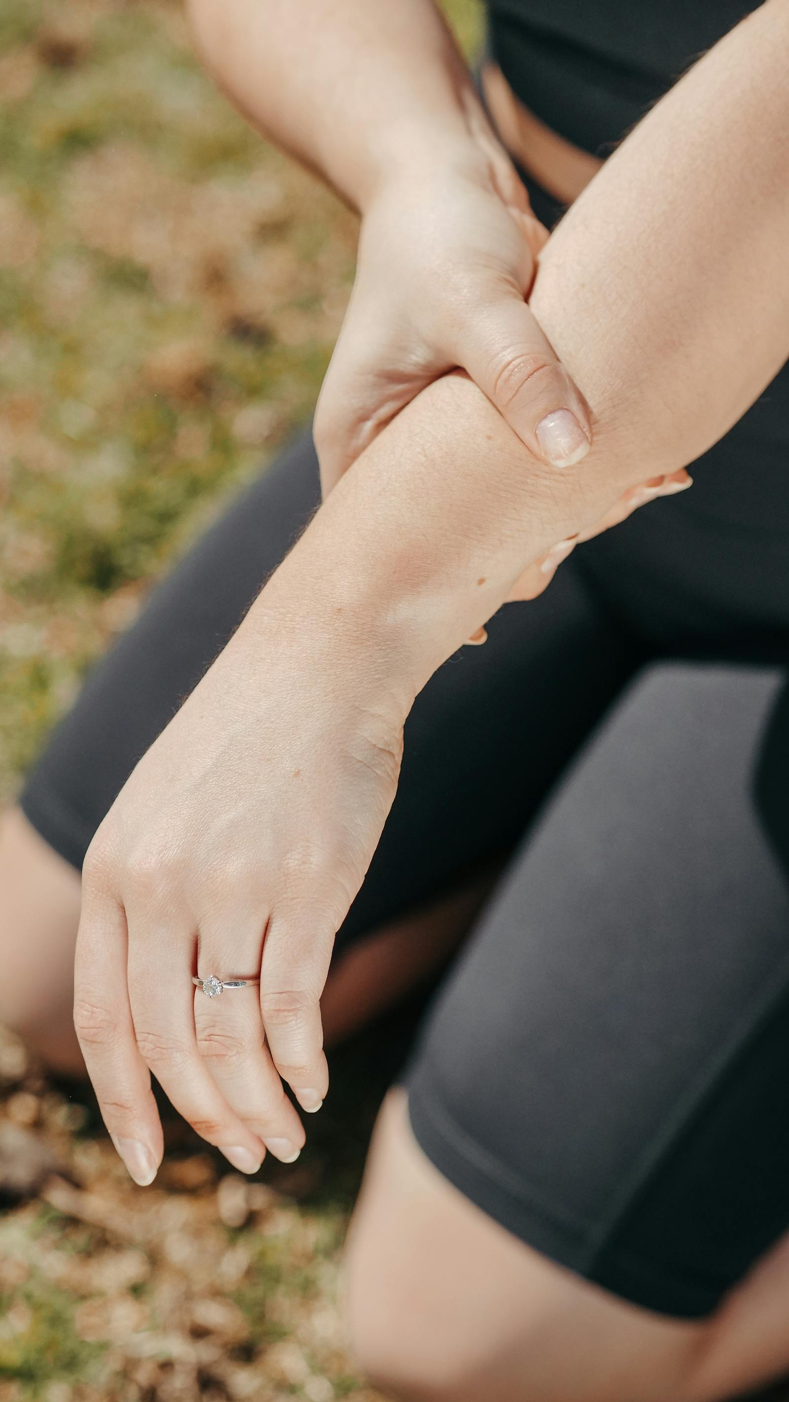 Woman holding her wrist in pain